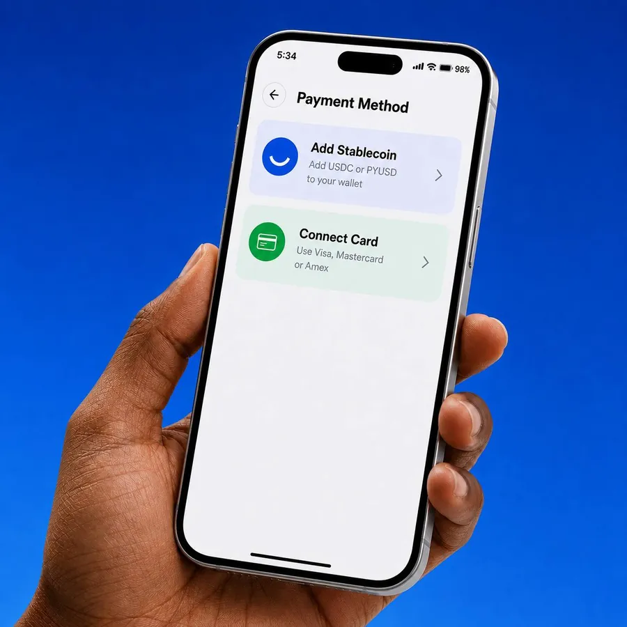 A hand holding a phone showing SmilePay's payment method screen: Add Stablecoin or Connect Card